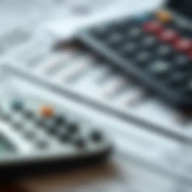 A calculator and a pile of tax-related paperwork