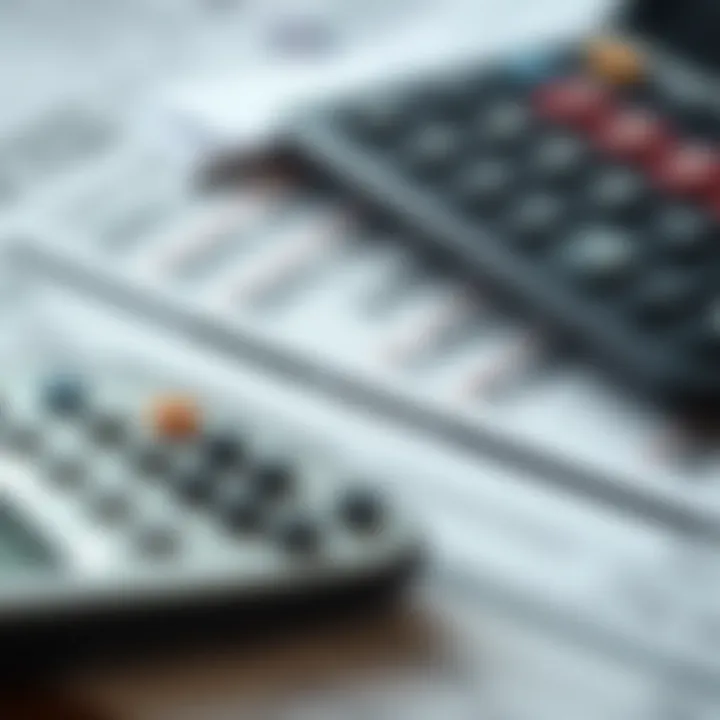 A calculator and a pile of tax-related paperwork